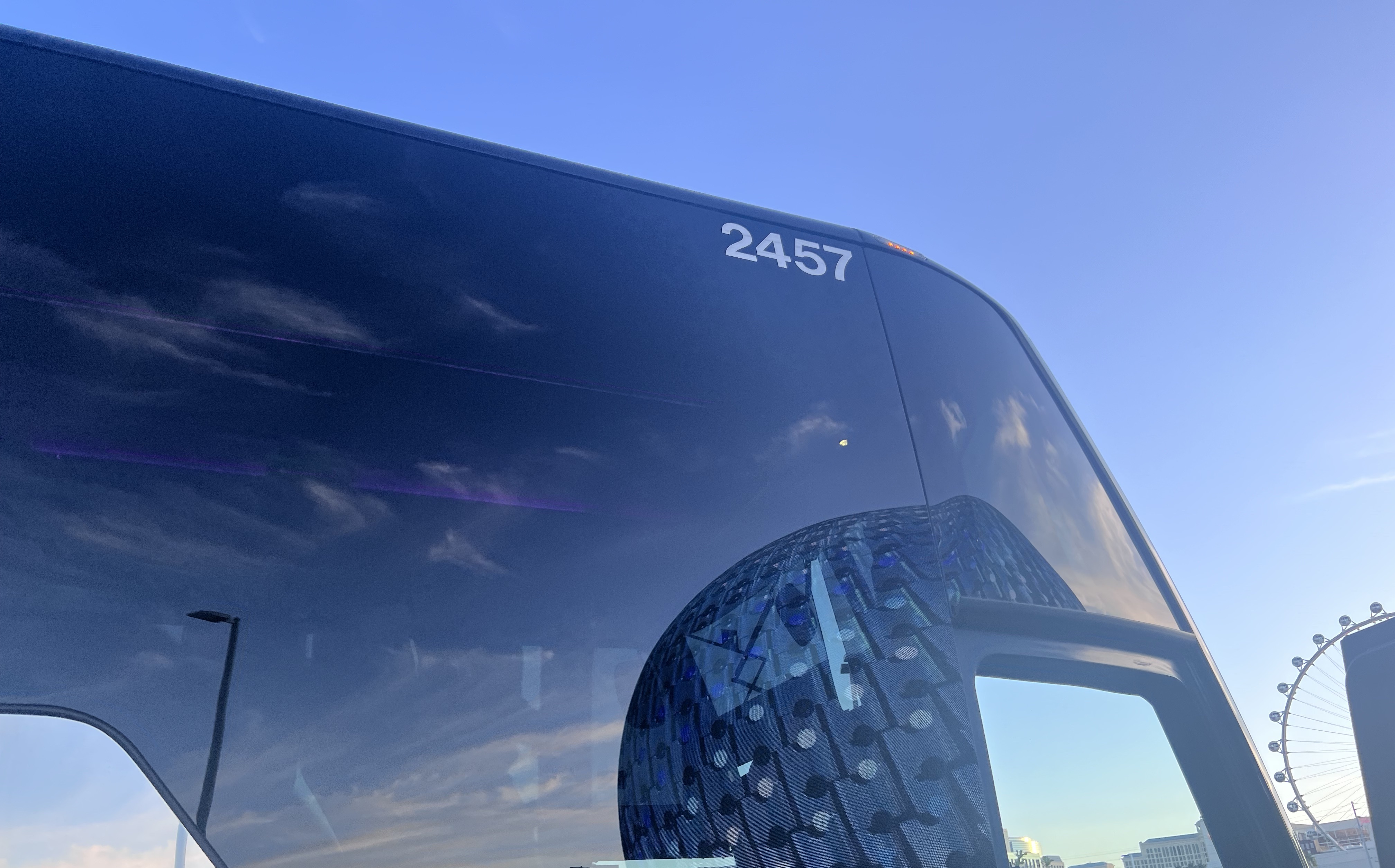 The Sphere reflected in the bus window