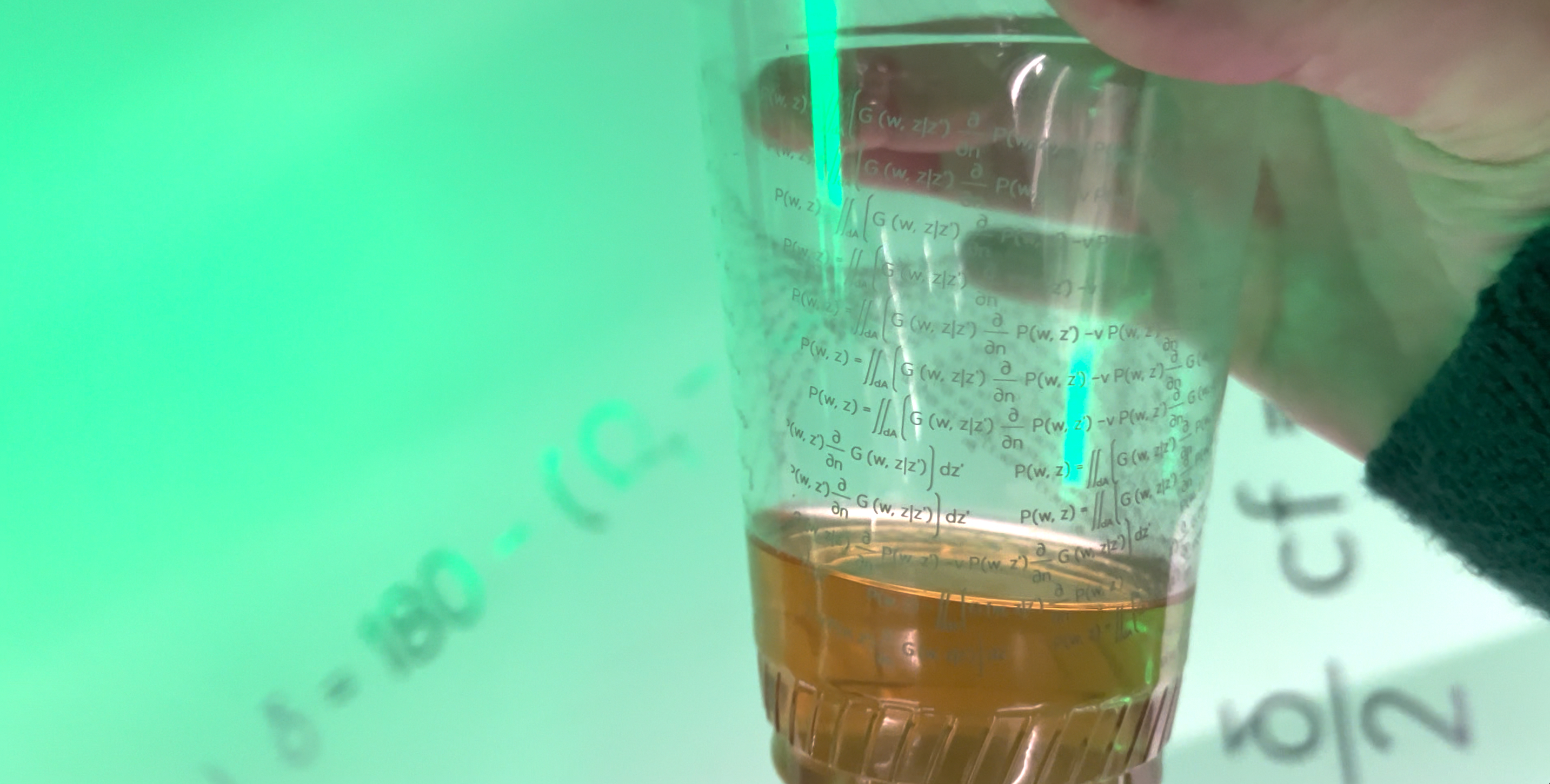 Beer cup with acoustic equations printed as a watermark