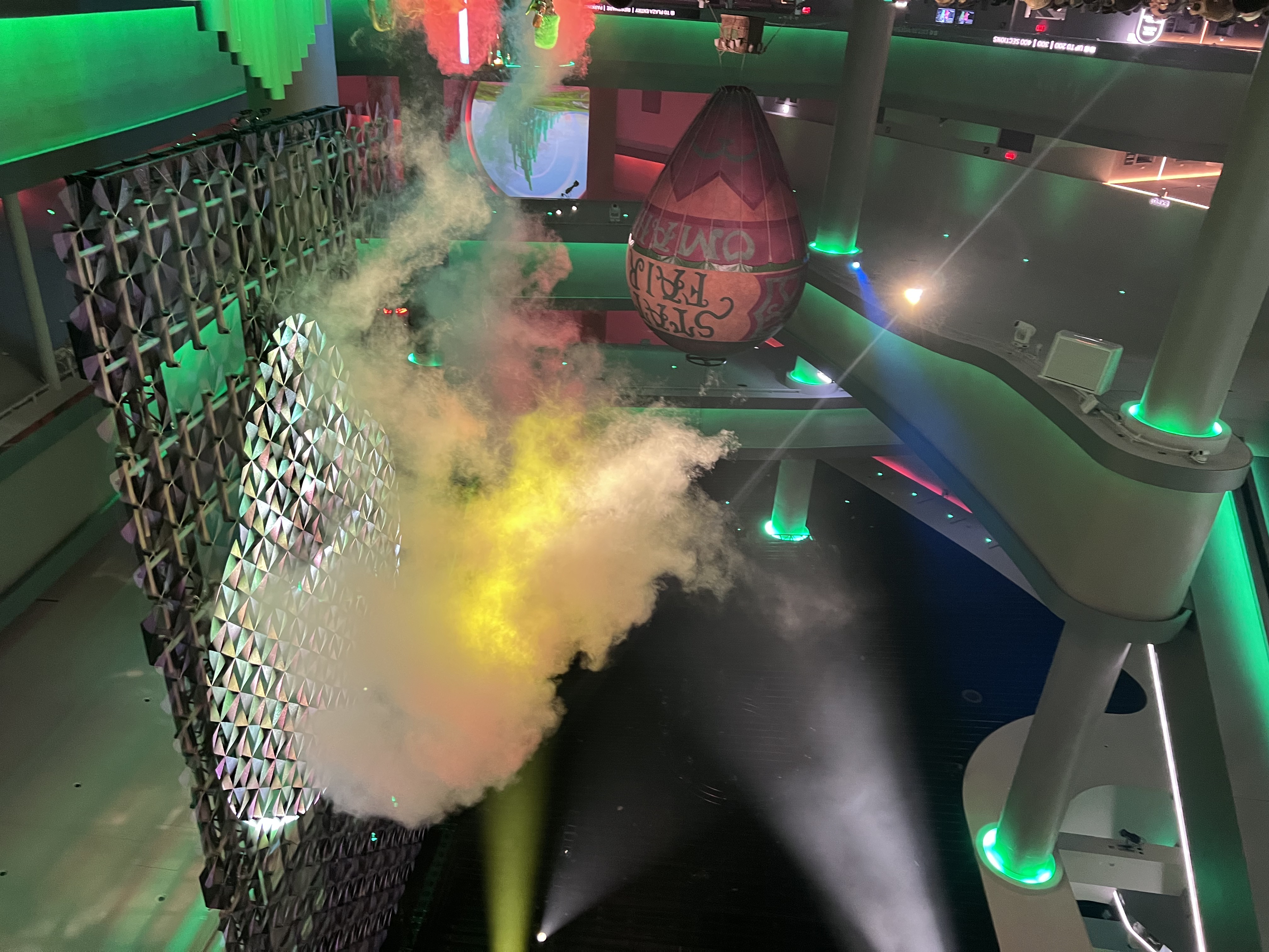 Lobby after the show — smoke, hot air balloon, the wizard projection