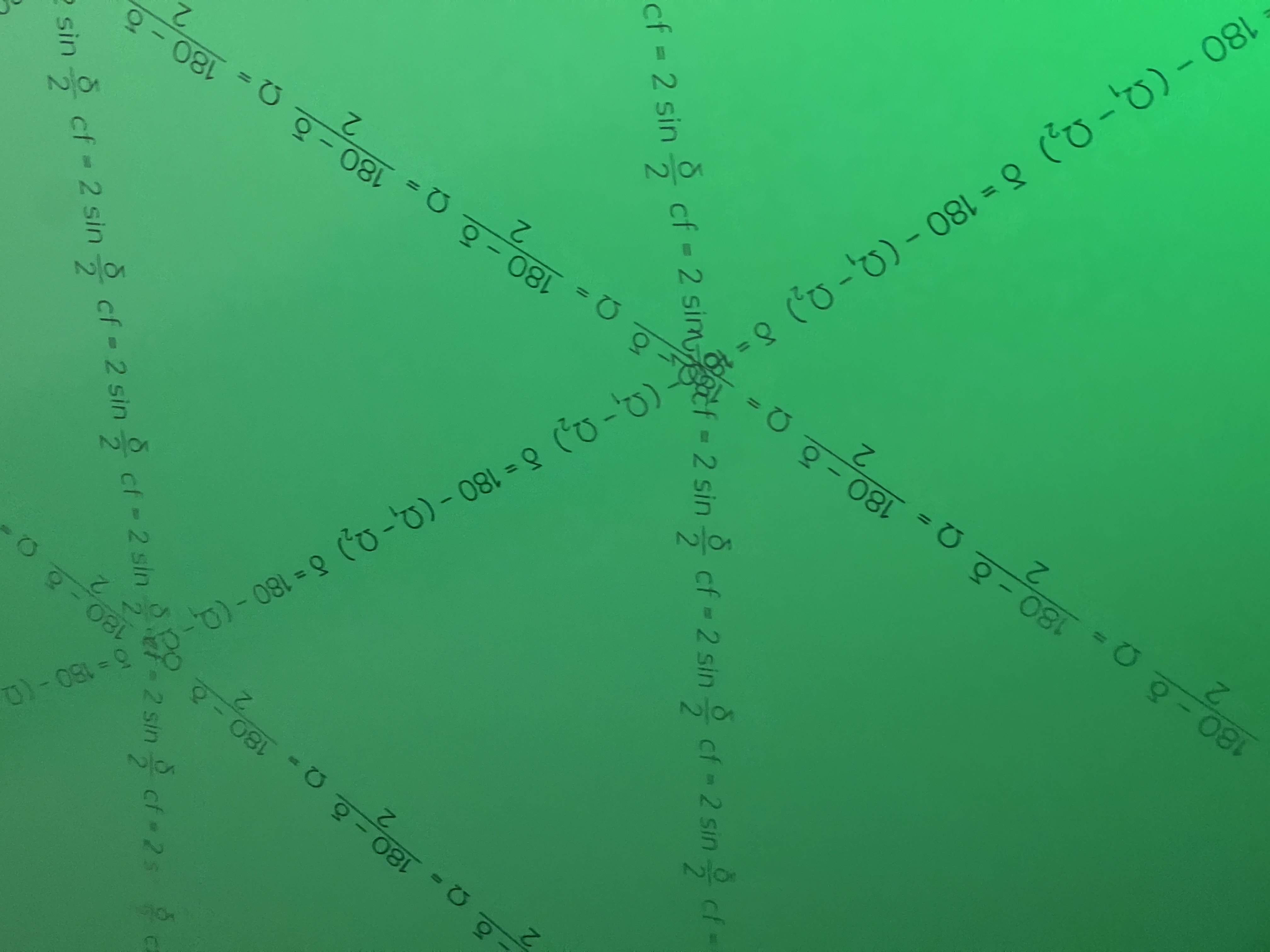 Equations tiled in Escher-like pattern across the lobby wall